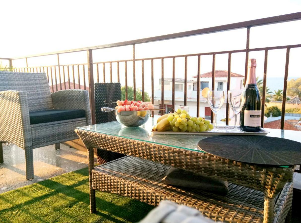 Pure Bliss: Luxury Beachfront Apartment with Panoramic Views Agia Triada  Exterior photo
