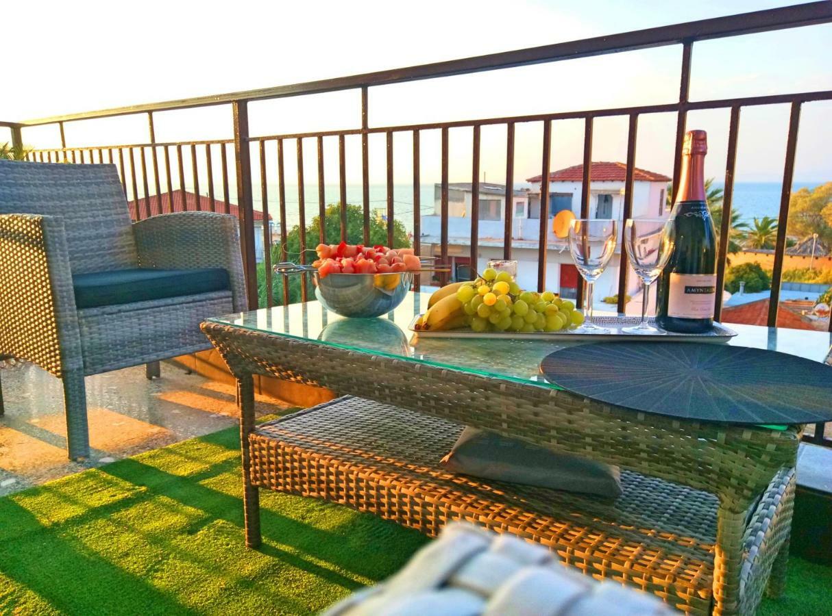 Pure Bliss: Luxury Beachfront Apartment with Panoramic Views Agia Triada  Exterior photo